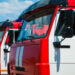 Car pool with fire engines of fire department